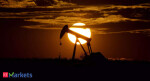 Oil rises on stronger economic outlook, U.S. stockpile draw