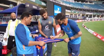Virat Kohli gifts his signed Indian cricket team jersey to Pakistan fast bowler Haris Rauf