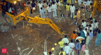 Bulldozer removes illegal structures outside politician Shrikant Tyagi's Noida flat