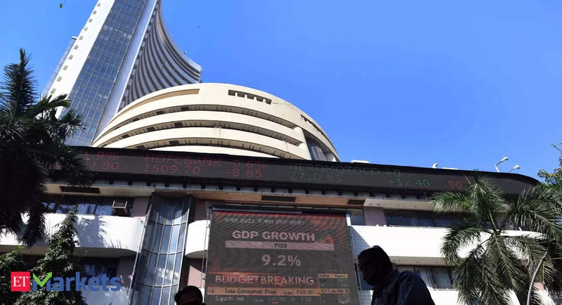 Sensex flat amid negative global cues; Nifty below 18,700