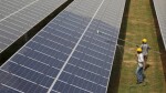 Adani Green to acquire Essel's 205 MW solar energy projects for Rs 1,300 cr